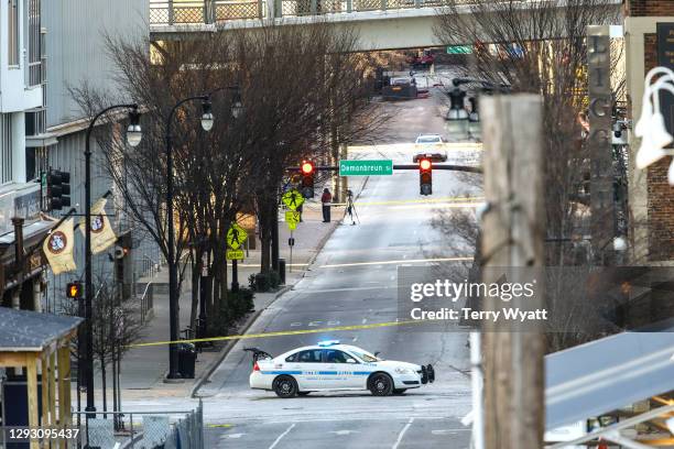 Police close off an area damaged by an explosion on Christmas morning on December 25, 2020 in Nashville, Tennessee. A Hazardous Devices Unit was en...