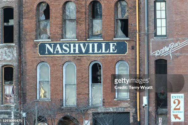 Police close off an area damaged by an explosion on Christmas morning on December 25, 2020 in Nashville, Tennessee. A Hazardous Devices Unit was en...