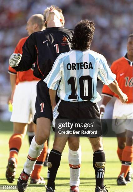 Ariel Ortega of Argentina headbutts Edwin van der Sar of Holland after having an appeal for a penalty turned down during the World Cup quater-final...