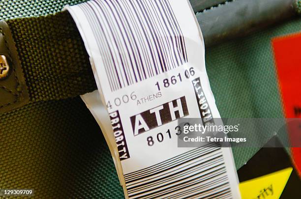 luggage tag for athens - étiquette de bagage photos et images de collection