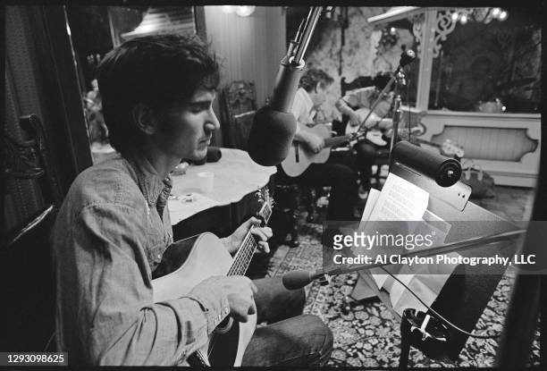 Singer, songwriter, musician Townes Van Zandt at Jack Clement Recording Studios, recording with Cowboy Jack Clement and others. Shot waist up in...
