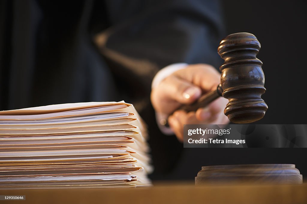 Judge holding gavel, close-up