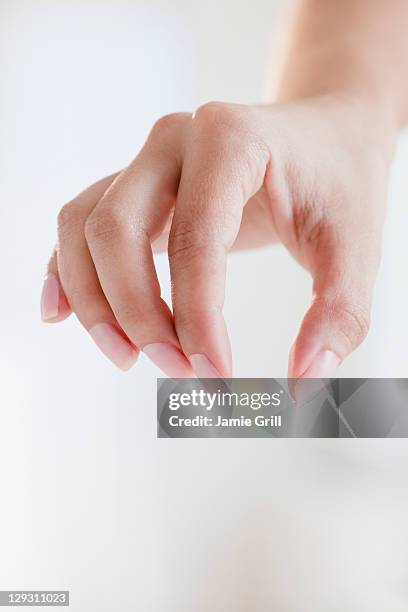 usa, new jersey, jersey city, close up of woman's hand - finger studio close up stock-fotos und bilder