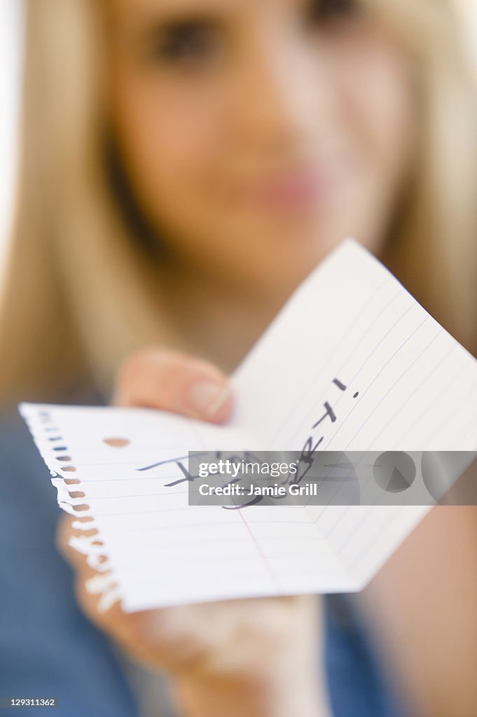 USA, New Jersey, Jersey City, Close up of woman showing apologize message