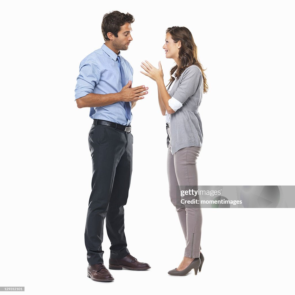 Business couple standing and having discussion