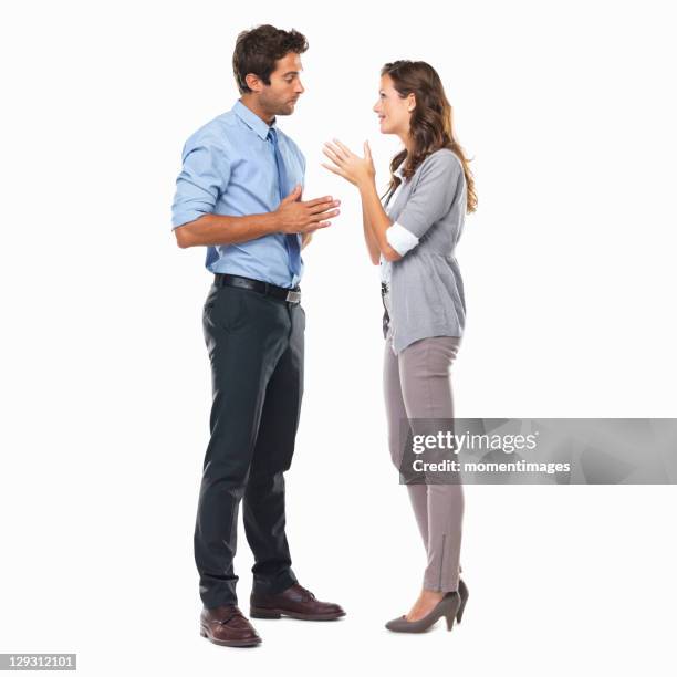 business couple standing and having discussion - gesturing stock pictures, royalty-free photos & images