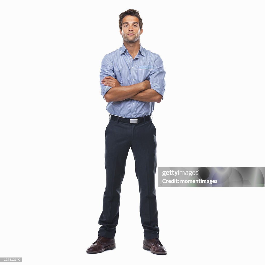 Confident business man standing with arms crossed