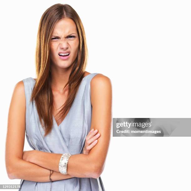 portrait of young distressed woman standing with hands folded - inflammation photos et images de collection