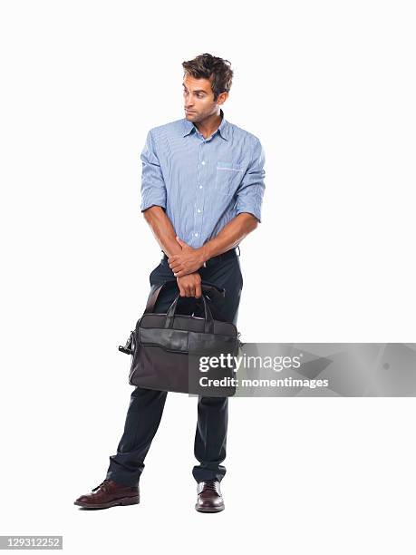 studio shot of executive holding business bag - wait photos et images de collection