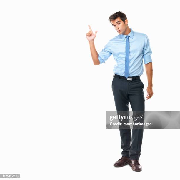 studio shot of business man pointing upwards - overhemd en stropdas stockfoto's en -beelden