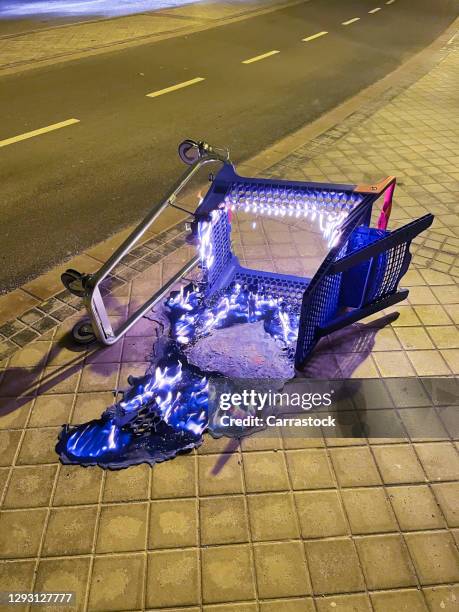 supermarket trolley for transporting burning food in the city - broken lamp stock pictures, royalty-free photos & images