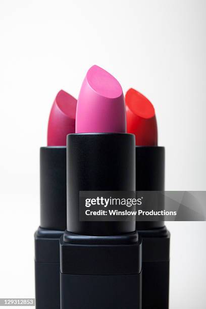 studio shot of lipsticks - pink vanity stock pictures, royalty-free photos & images