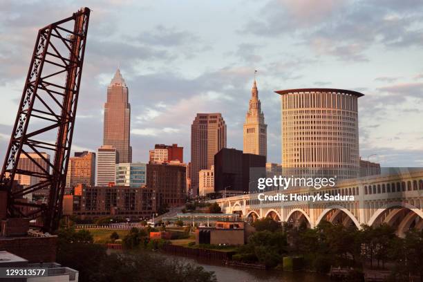 usa, ohio, cleveland, city at sunset - cleveland sunset stock pictures, royalty-free photos & images