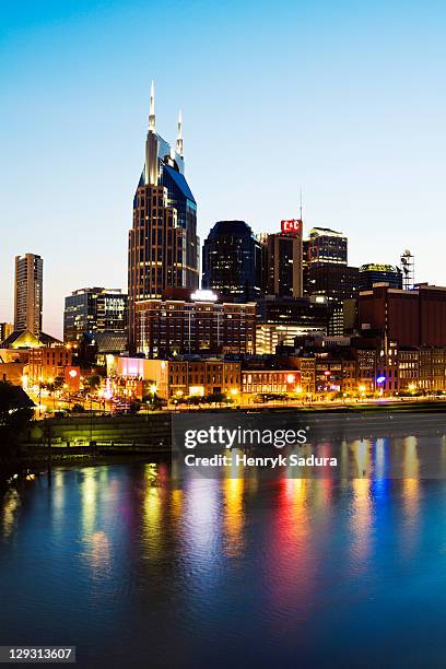 usa, tennessee, nashville, evening skyline - nashville downtown district stock pictures, royalty-free photos & images