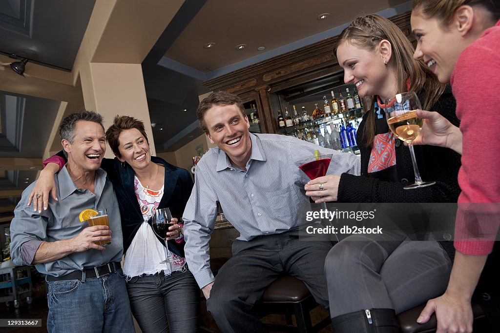 USA, Colorado, Telluride, Group of people enjoying apres ski drink in bar