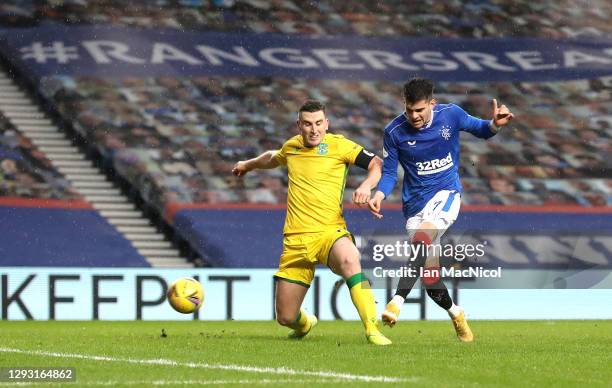 Ianis Hagi of Rangers scores their team's first goal during the Ladbrokes Scottish Premiership match between Rangers and Hibernian at Ibrox Stadium...