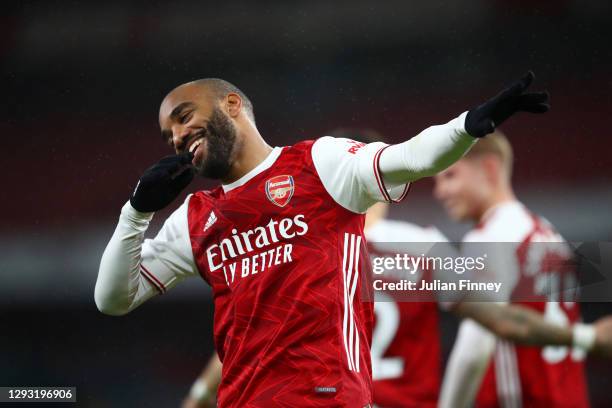 Alexandre Lacazette of Arsenal celebrates after scoring his team's first goal during the Premier League match between Arsenal and Chelsea at Emirates...