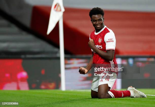 Bukayo Saka of Arsenal celebrates after scoring his team's third goal during the Premier League match between Arsenal and Chelsea at Emirates Stadium...