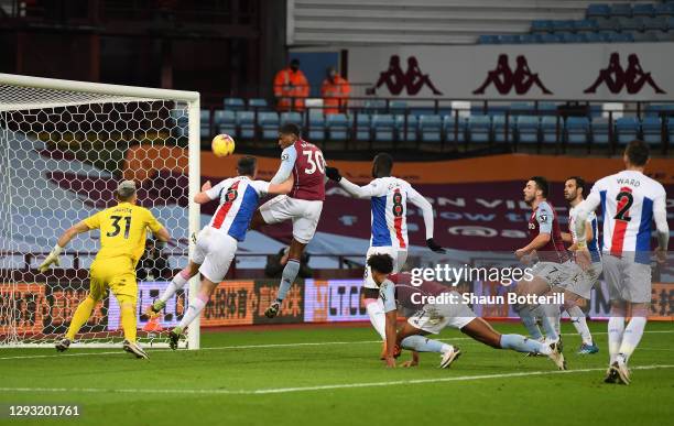 Kortney Hause of Aston Villa scores during the Premier League match between Aston Villa and Crystal Palace at Villa Park on December 26, 2020 in...