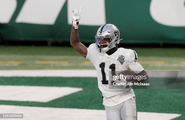 Henry Ruggs III of the Las Vegas Raiders celebrates his fourth quarter touchdown against the New York Jets at MetLife Stadium on December 06, 2020 in...