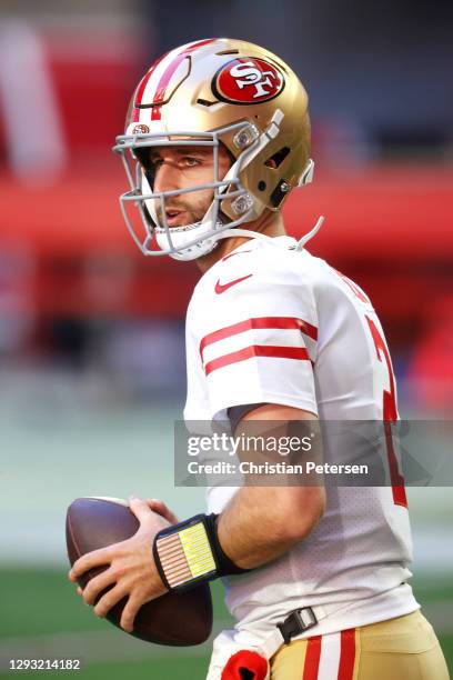 Quarterback Josh Rosen of the San Francisco 49ers looks on during warmups before the game against the Arizona Cardinals at State Farm Stadium on...