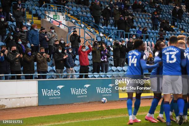 Carlisle fans wearing face coverings celebrate the second Carlisle goal from the socially distanced seating area during the Sky Bet League Two match...