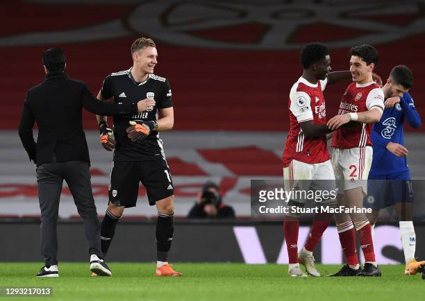 Arsenal manager Mikel Arteta, Bernd Leno, Bukayo Saka and Hector Bellerin celebrate after after the Premier League match between Arsenal and Chelsea...