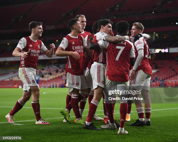 Bukayo Saka celebrates scoring Arsenal's 3rd goal with Hector Bellerin during the warm up before the Premier League match between Arsenal and Chelsea...