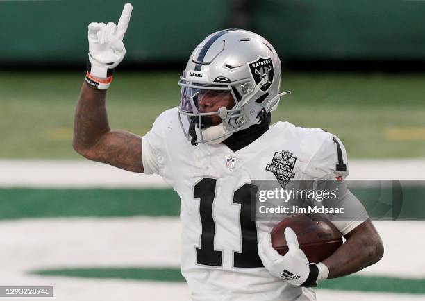 Henry Ruggs III of the Las Vegas Raiders celebrates his fourth quarter touchdown against the New York Jets at MetLife Stadium on December 06, 2020 in...