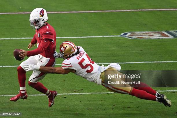 Quarterback Kyler Murray of the Arizona Cardinals is forced out of bounds by linebacker Fred Warner of the San Francisco 49ers during the second half...
