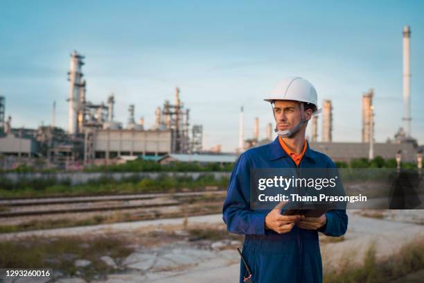 engineer on modern power station construction site - biomasse stock-fotos und bilder