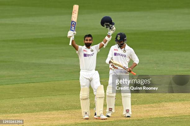 Ajinkya Rahane of India celebrates making his century during day two of the Second Test match between Australia and India at Melbourne Cricket Ground...