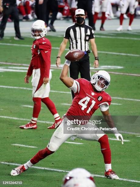 Running back Kenyan Drake of the Arizona Cardinals celebrates after scoring on a one-yard touchdown rush during the fourth quarter of the NFL game...