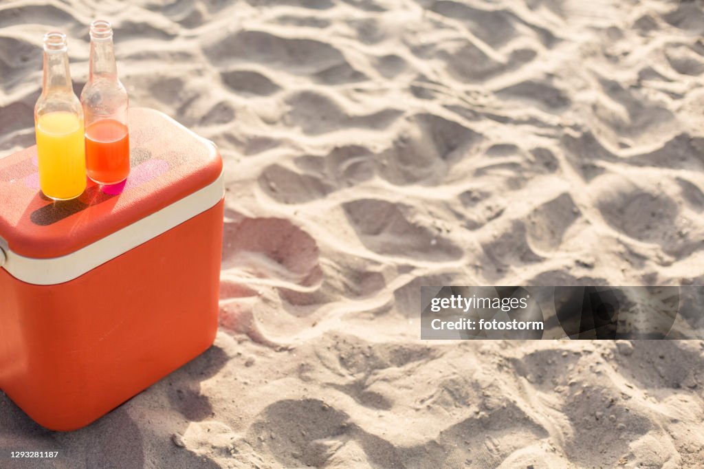 Cocktails on the beach being enjoyed during a day time party