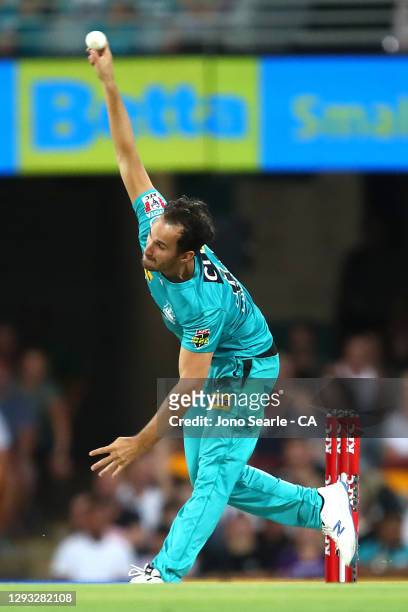 Lewis Gregory of the Heat bowls the ball during the Big Bash League match between the Brisbane Heat and the Hobart Hurricanes at The Gabba, on...