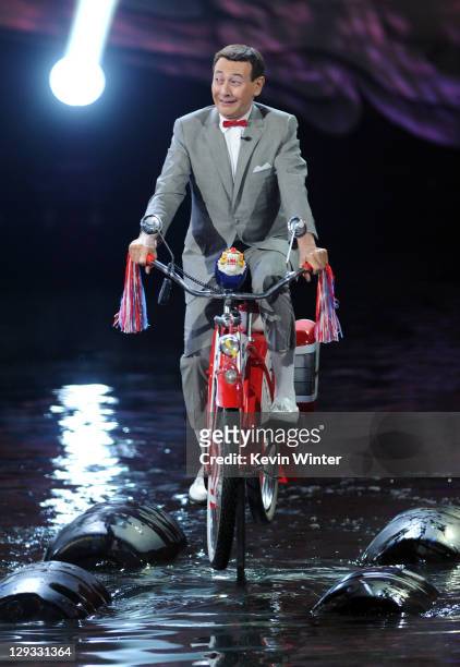 Actor Paul Reubens aka "Pee Wee Herman" accepts an award onstage onstage during Spike TV's "SCREAM 2011" awards held at Universal Studios on October...