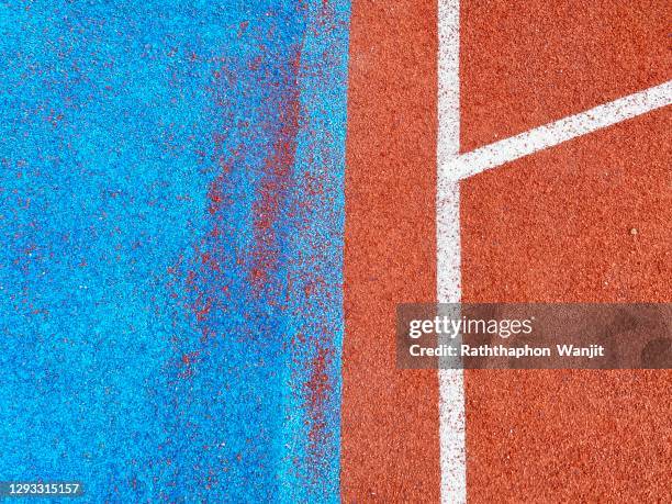 the white line that forms a running track. - sports turf stock pictures, royalty-free photos & images