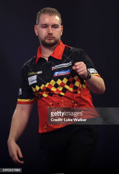 Dimitri Van den Bergh of Belgium reacts during his third round match against Jermaine Wattimena of The Netherlands during day ten of the PDC William...