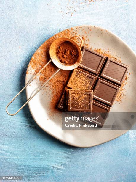chocolate, set of dark chocolate pieces, - caramel block stock pictures, royalty-free photos & images