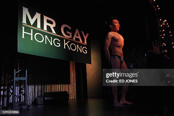 In a photo taken on October 15, 2011 'Mr. Gay Hong Kong 2011' contestant Edmund Lee Ho Chun performs during the competition's final pageant at the...