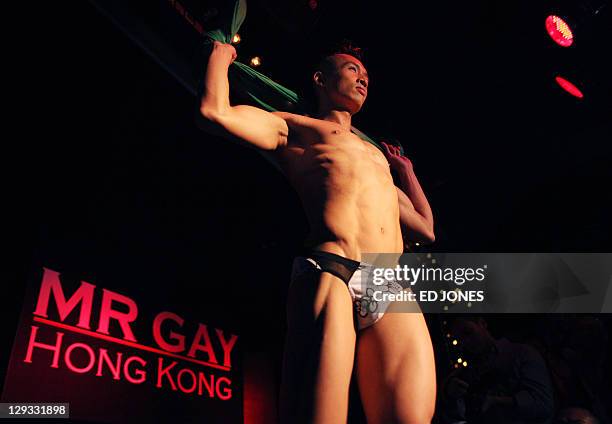 In a photo taken on October 15, 2011 'Mr. Gay Hong Kong 2011' winner Jimmy Wong Chun performs during the competition's final pageant at the Bisous...