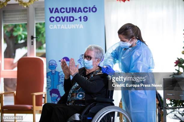 Josefa Perez is 89 years old and she is the first woman to be vaccinated in Catalonia, during the first day of vaccination in Spain against Covid-19,...