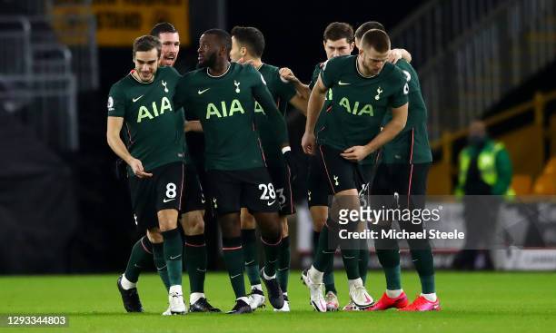 Tanguy NDombele of Tottenham Hotspur celebrates with teammate Harry Winks after scoring their team's first goal during the Premier League match...