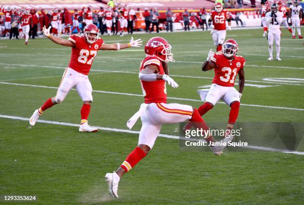 Demarcus Robinson of the Kansas City Chiefs celebrates his touchdown against the Atlanta Falcons with Travis Kelce and Darrell Williams during the...