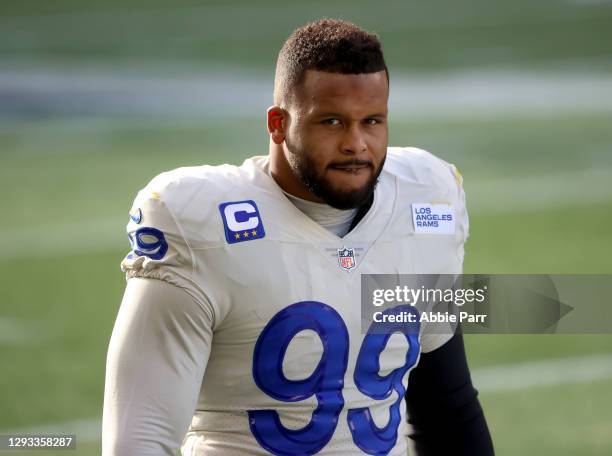 Aaron Donald of the Los Angeles Rams looks on before the game against the Seattle Seahawks at Lumen Field on December 27, 2020 in Seattle, Washington.