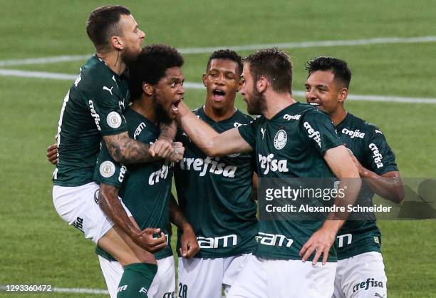 Luiz Adriano of Palmeiras celebrates with his team mates after scoring the first goal of their team during the match against Red Bull Bragantino as...