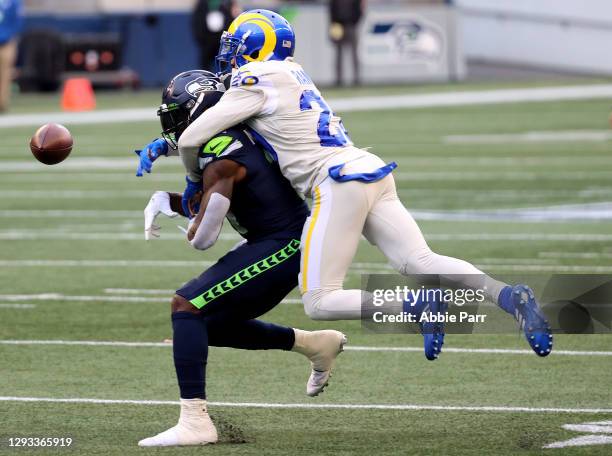Jalen Ramsey of the Los Angeles Rams breaks up a pass intended for DK Metcalf of the Seattle Seahawks during the second quarter at Lumen Field on...