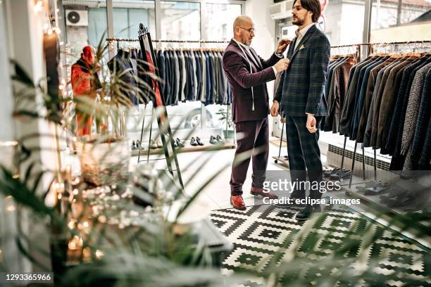 this one is good fit for you - menswear stock pictures, royalty-free photos & images