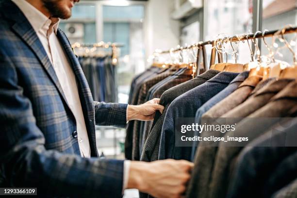 this one match perfect with me - men shopping stock pictures, royalty-free photos & images