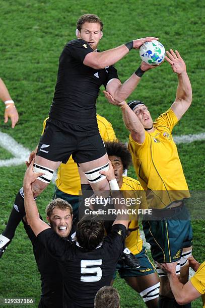 New Zealand All Black No8 Kieran Read and Australian Wallabies lock Dan Vickerman vie during the 2011 Rugby World Cup semi-final match Australia vs...